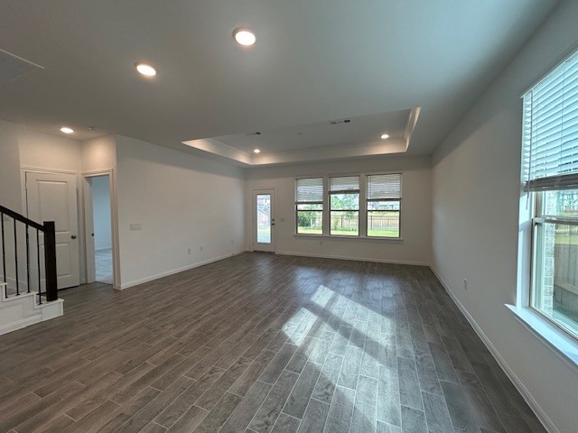 26711 Grandiflora Drive Magnolia, TX 77355 - Photo 4 of 19 an empty room with wooden floor and windows
