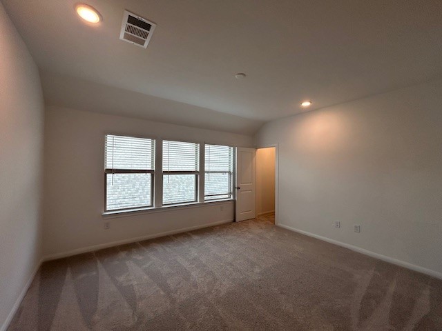 26711 Grandiflora Drive Magnolia, TX 77355 - Photo 10 of 19 an empty room with a empty space and windows