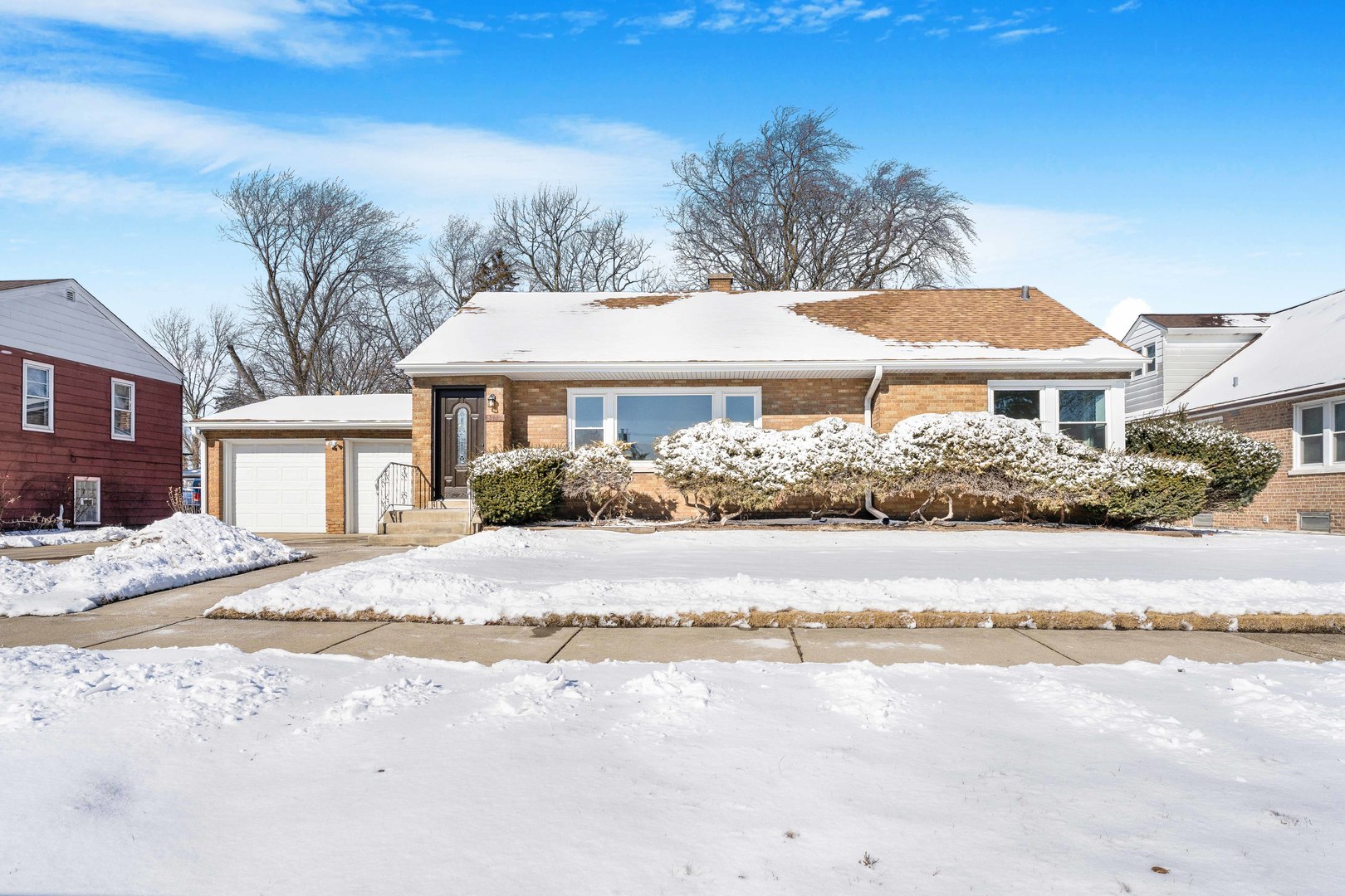 8110 46th Street Lyons, IL 60534 - Photo 2 of 26 a front view of a house with a yard