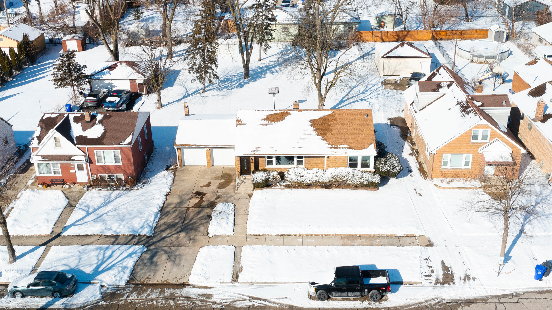 8110 46th Street Lyons, IL 60534 - Photo 25 of 26 a view of a white house with a large tree