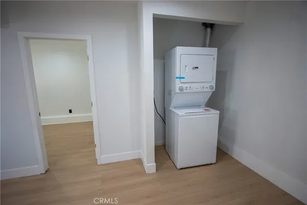 a view of a storage & utility room with washer and dryer