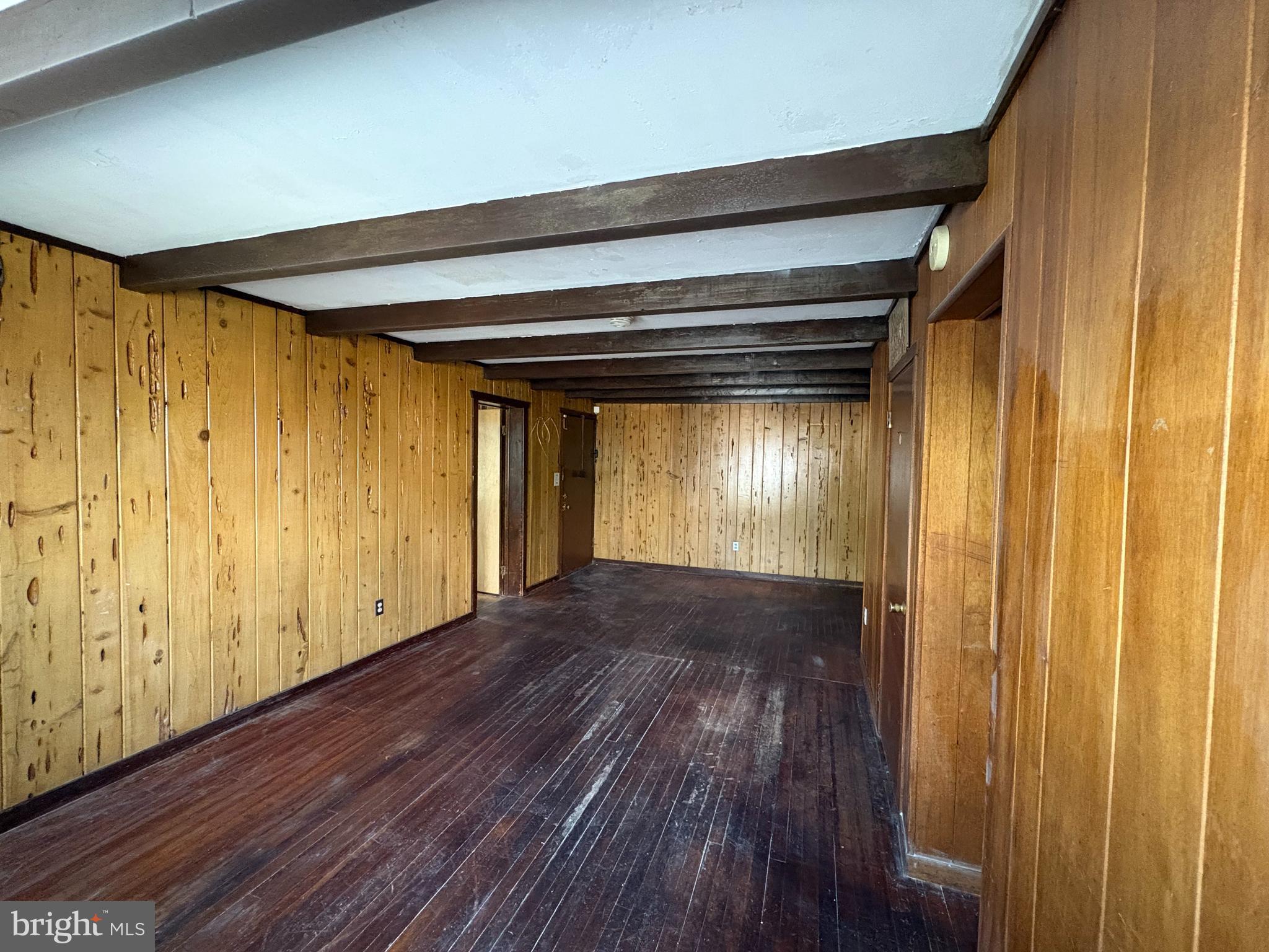 1405 Pennington Road, Unit 2A Ewing, NJ 08618 - Photo 8 of 12 a view of empty room with wooden floor
