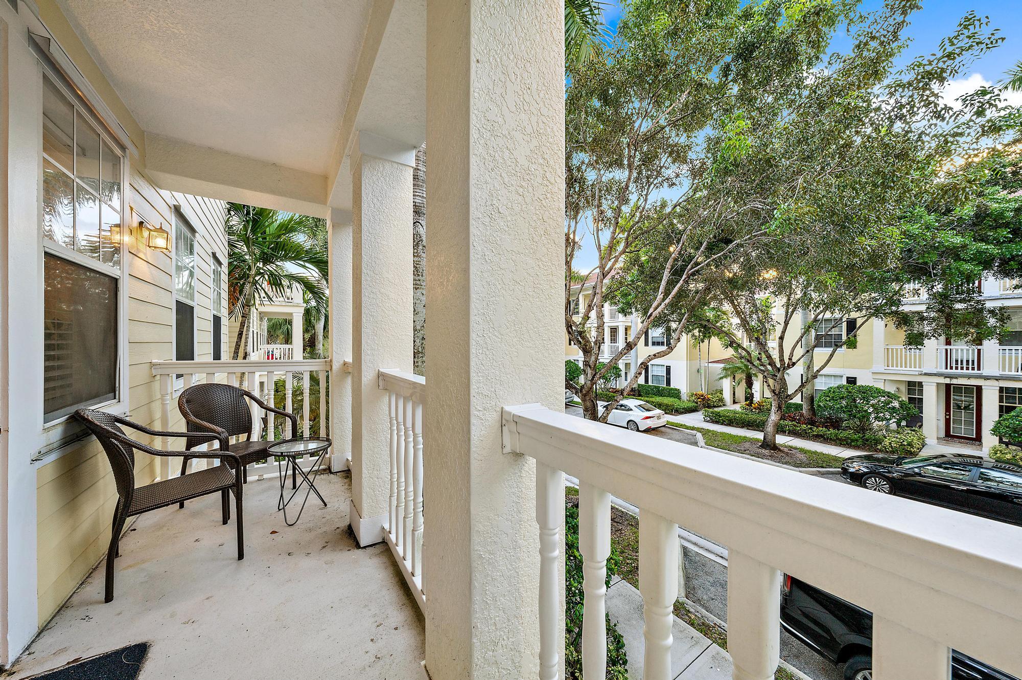 225 Murcia Drive, Unit 201 Jupiter, FL 33458 - Photo 20 of 42 a view of a balcony with furniture
