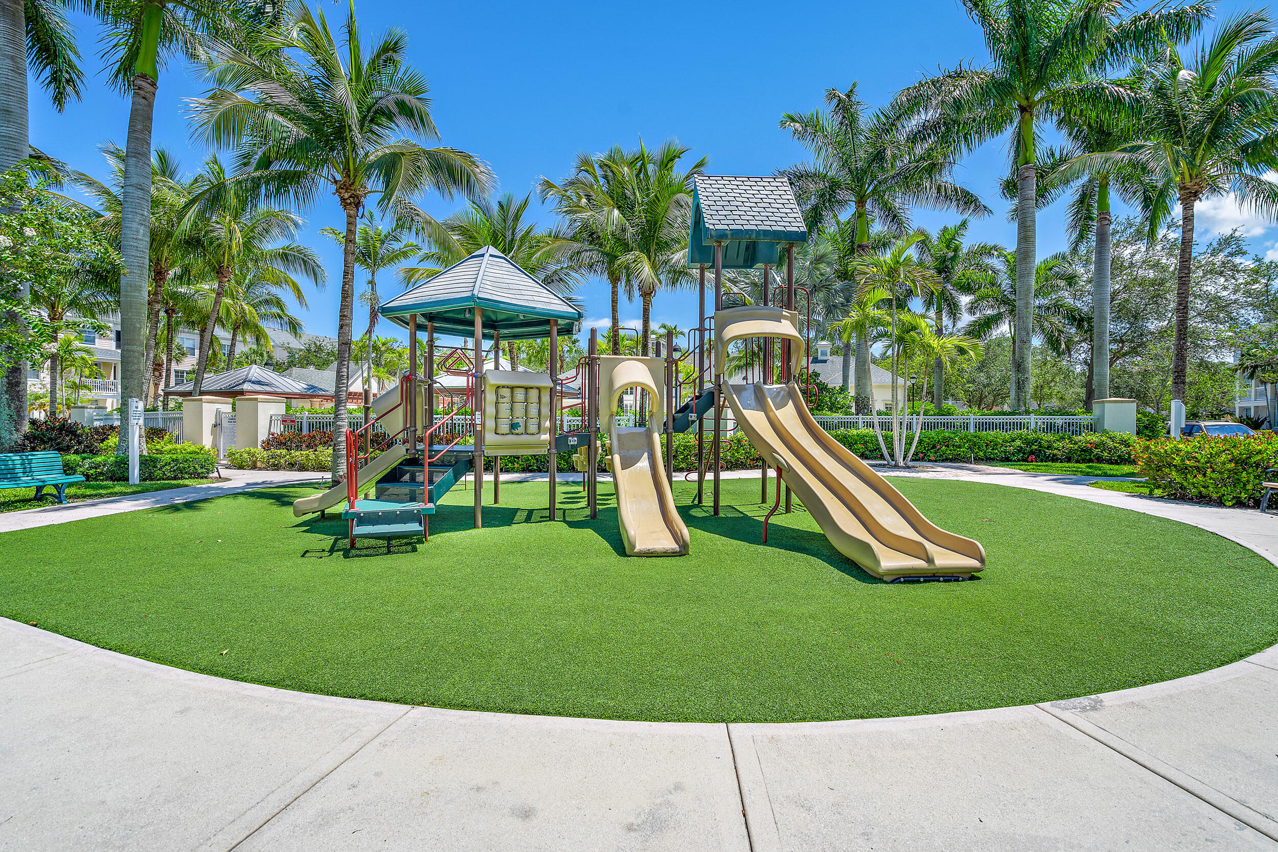 225 Murcia Drive, Unit 201 Jupiter, FL 33458 - Photo 29 of 42 a view of a park with a slide