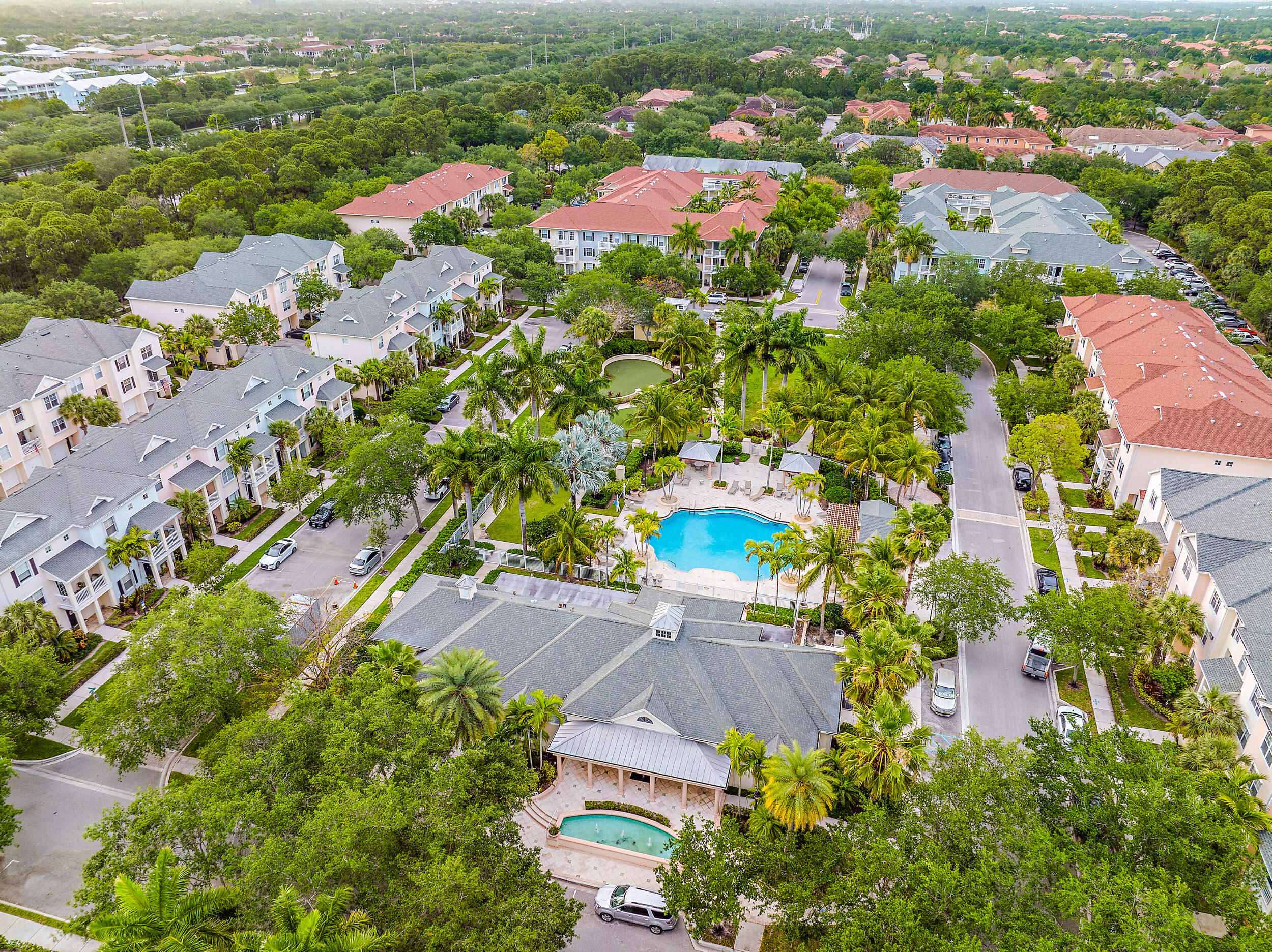225 Murcia Drive, Unit 201 Jupiter, FL 33458 - Photo 31 of 42 an aerial view of residential houses with outdoor space
