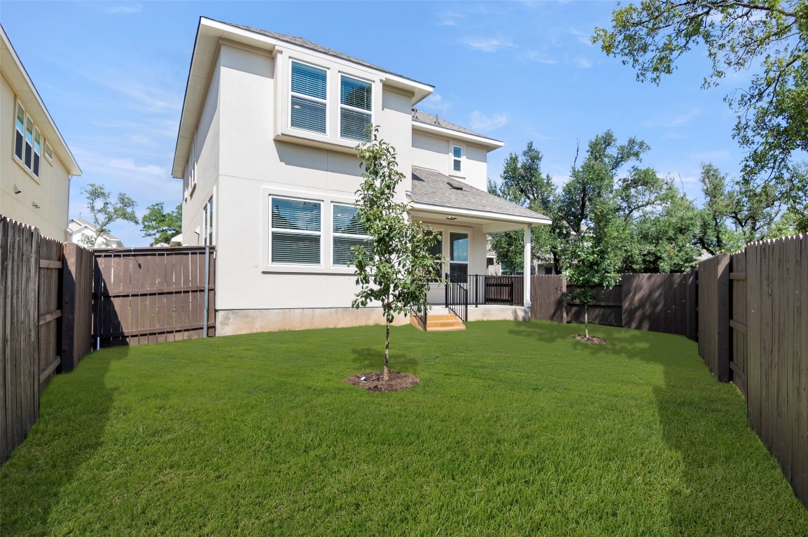 2605 Sam Bass Road, Unit 87 Round Rock, TX 78681 - Photo 31 of 31 a view of house with a backyard