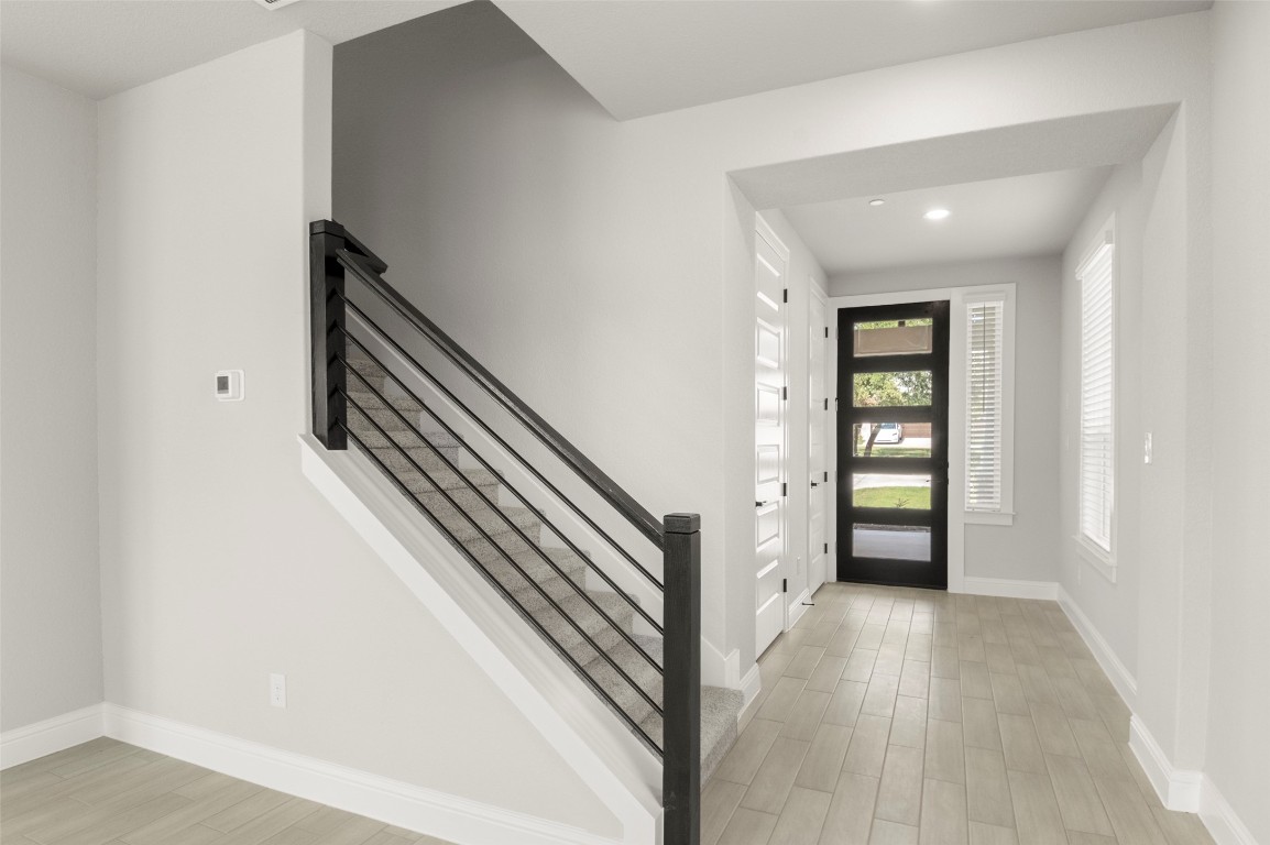 2605 Sam Bass Road, Unit 87 Round Rock, TX 78681 - Photo 4 of 31 a view of a hallway with entryway and stairs