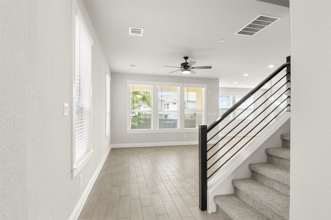 2605 Sam Bass Road, Unit 87 Round Rock, TX 78681 - Photo 5 of 31 a view of an entryway with wooden floor and staircase