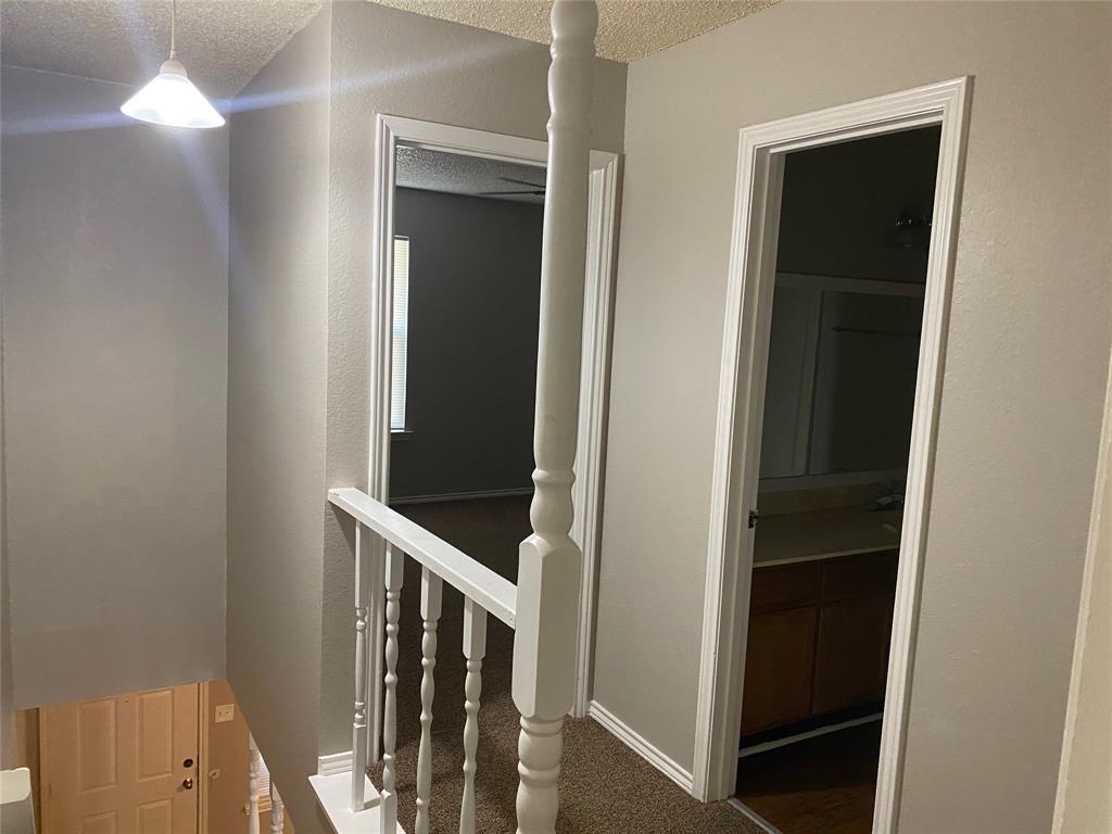 1607 North Nolan River Road, Unit D Cleburne, TX 76033 - Photo 2 of 7 a view of stairs