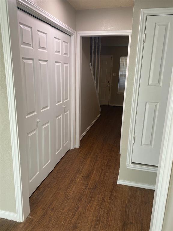 1607 North Nolan River Road, Unit D Cleburne, TX 76033 - Photo 4 of 7 a view of a hallway with wooden floor