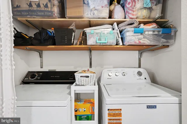 a balcony with furniture and a potted plant