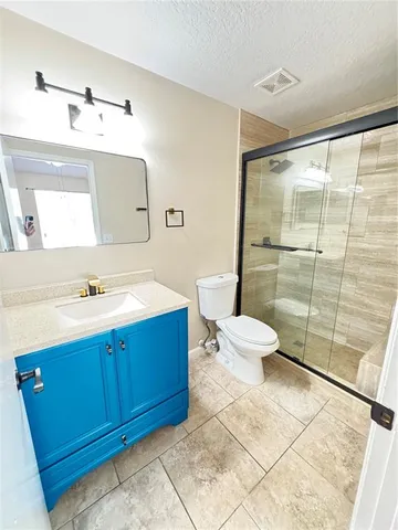 a bathroom with a sink and a shower