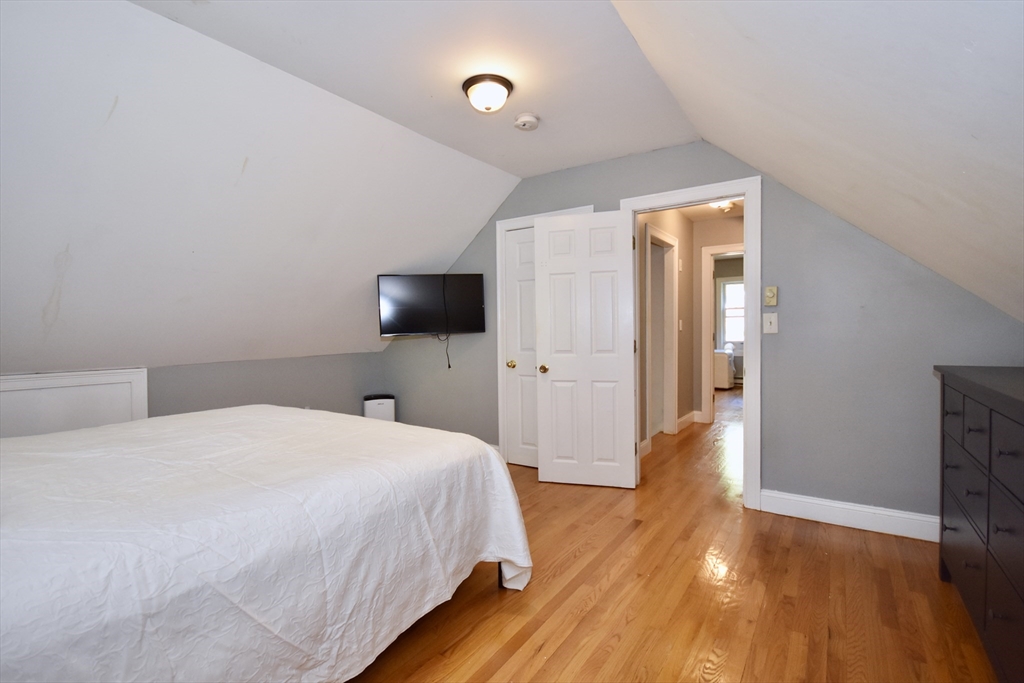 296 Lincoln Road Barnstable, MA 02601 - Photo 20 of 20 a bedroom with a bed and a flat screen tv