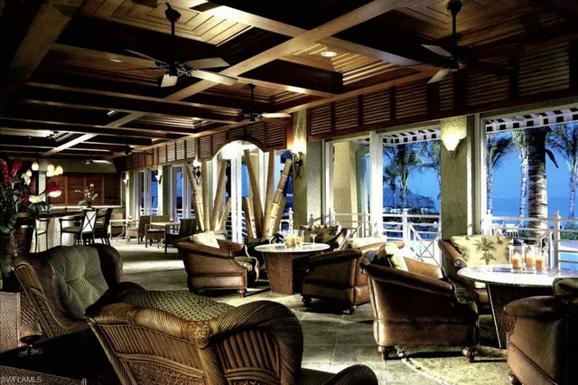 a view of a livingroom with furniture and a table