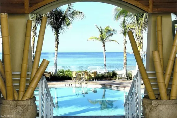 a view of a balcony with ocean view