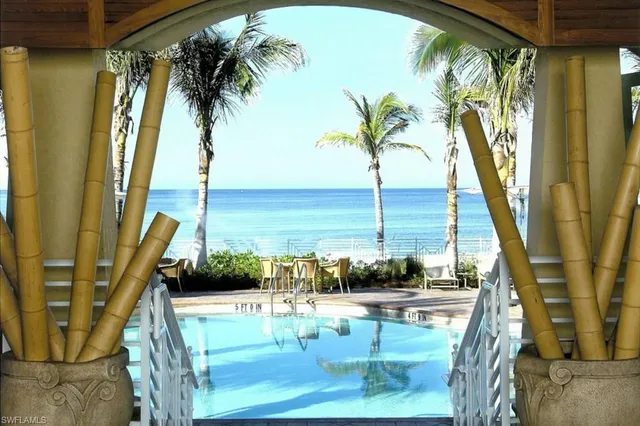 a view of a balcony with ocean view