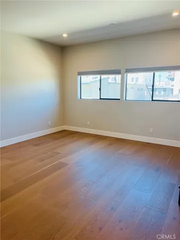 a bathroom with a double vanity sink toilet and shower