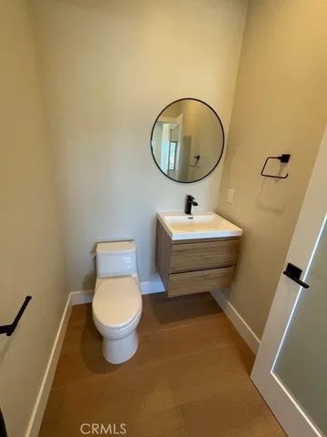 a bathroom with 2 sink tub and a mirror