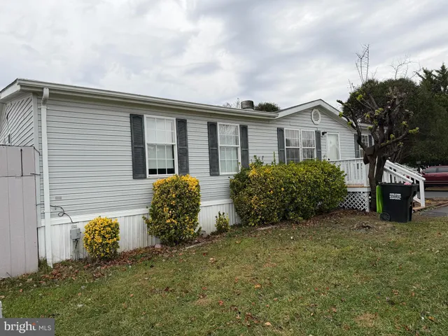 a view of a house with a garden