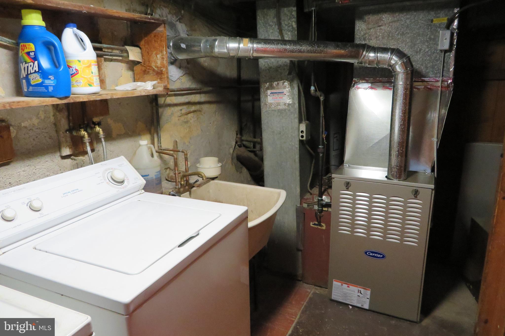 633 Ashmead Road Cheltenham, PA 19012 - Photo 23 of 40 Basement laundry room and new heater.