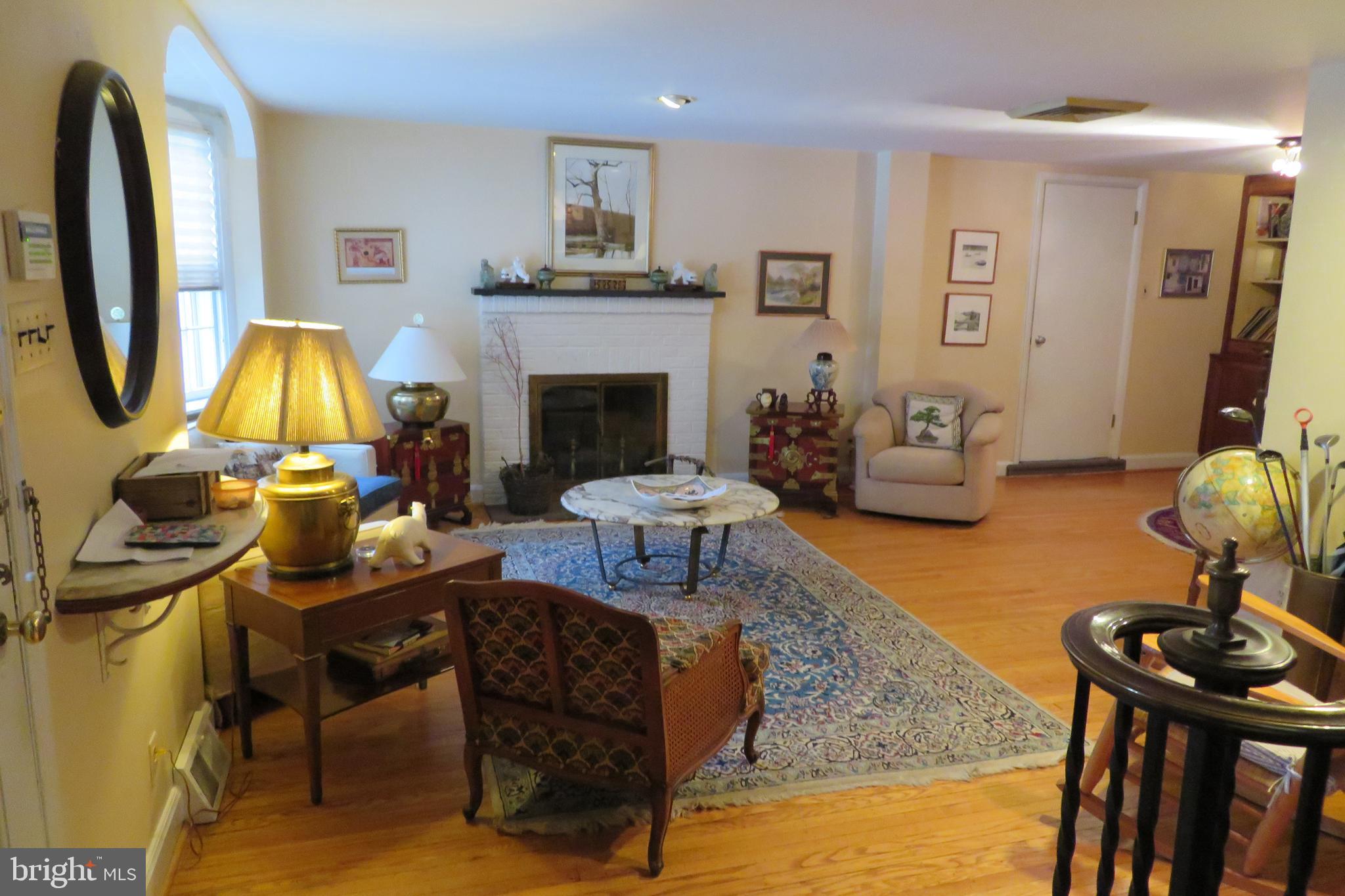 633 Ashmead Road Cheltenham, PA 19012 - Photo 7 of 40 Living room with gas/wood fireplace.