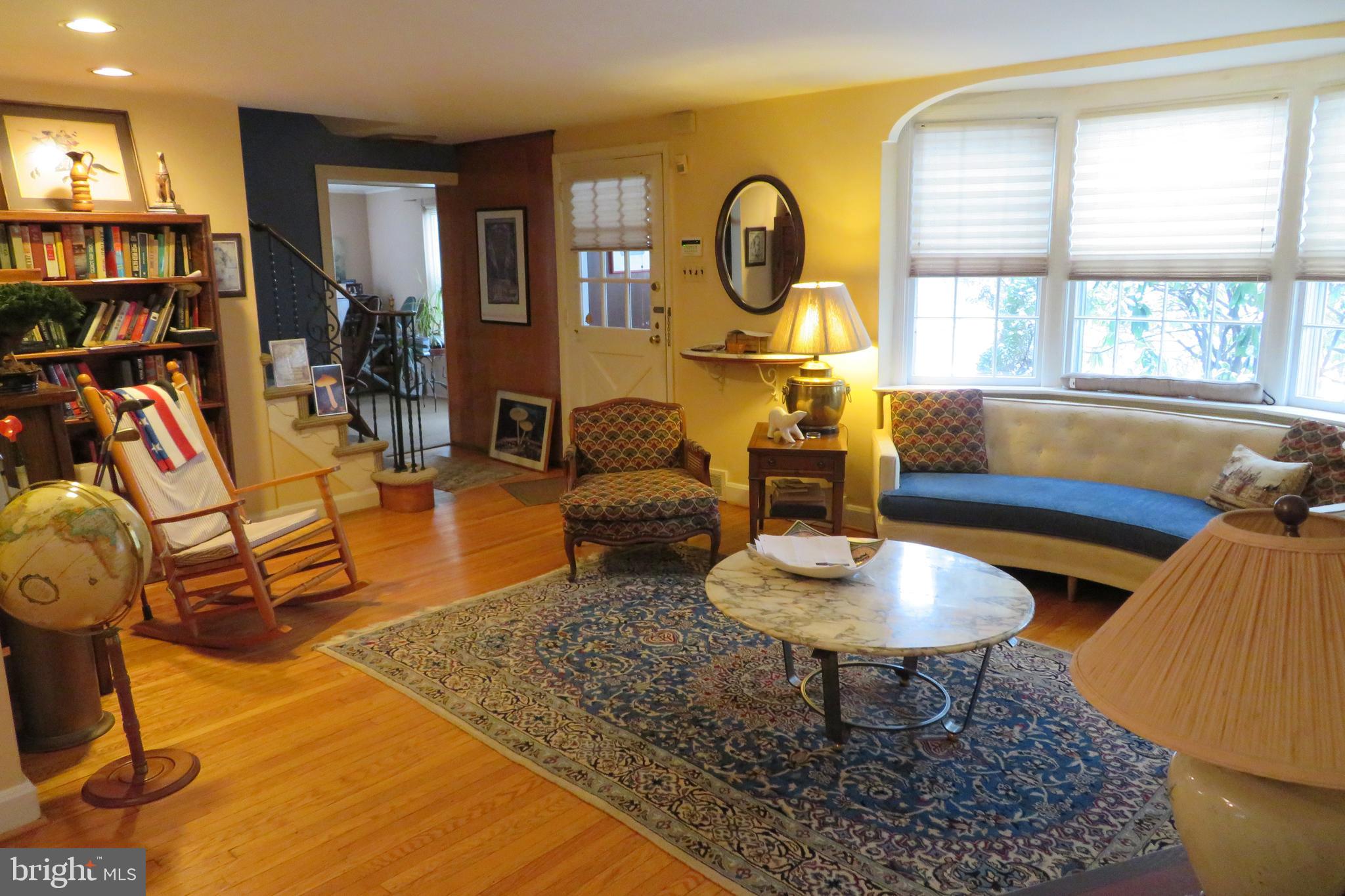 633 Ashmead Road Cheltenham, PA 19012 - Photo 8 of 40 Living room showing bay window and hardwood floors