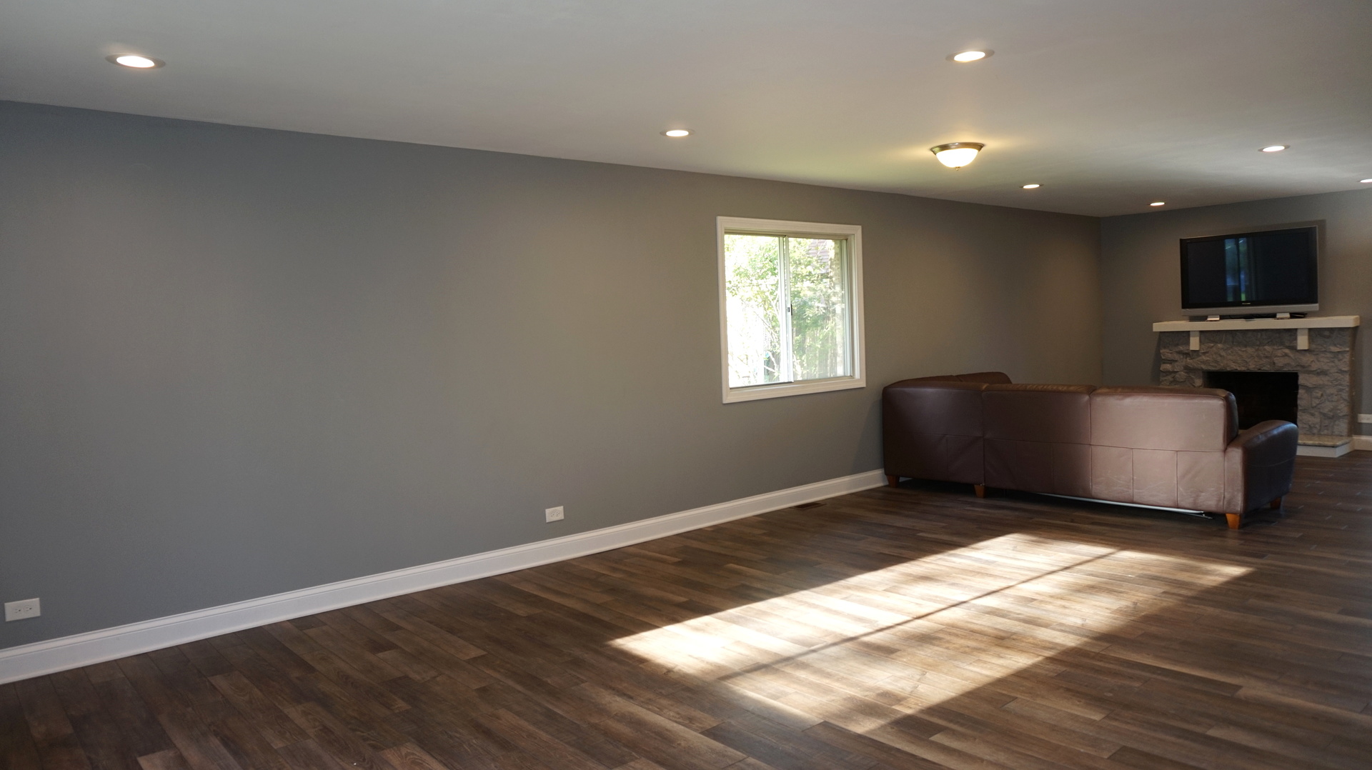 5740 Timberlane Road Matteson, IL 60443 - Photo 3 of 17 a view of an empty room with a window and wooden floor