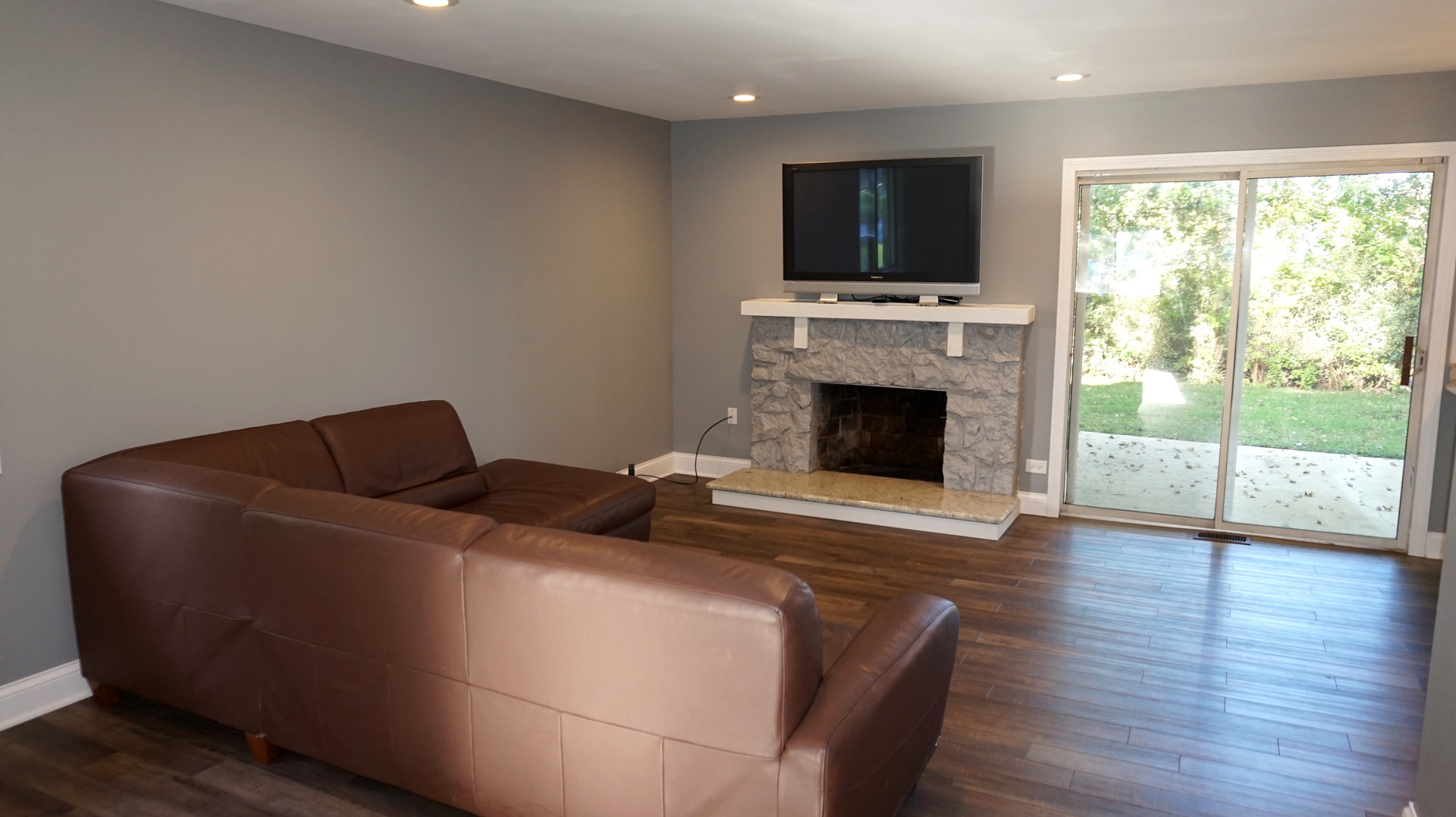 5740 Timberlane Road Matteson, IL 60443 - Photo 5 of 17 a living room with furniture fireplace and flat screen tv