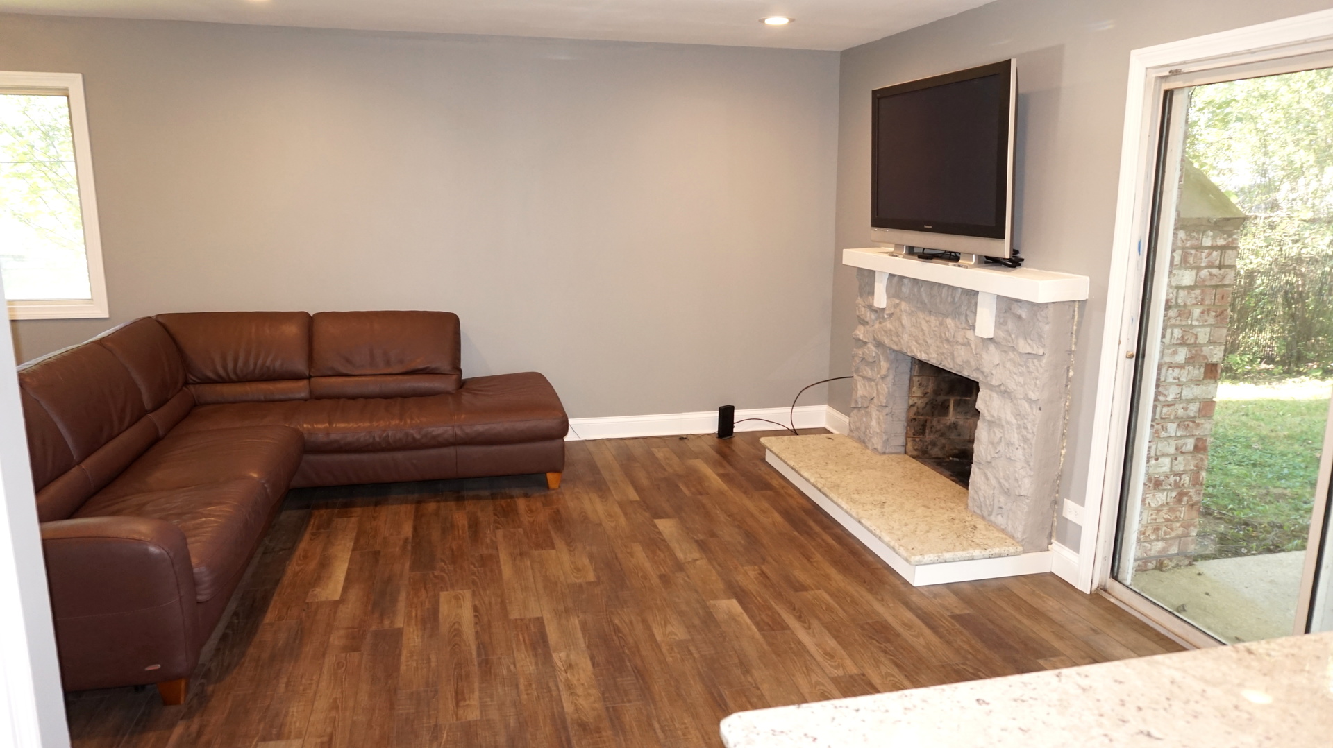 5740 Timberlane Road Matteson, IL 60443 - Photo 8 of 17 a living room with furniture and a flat screen tv