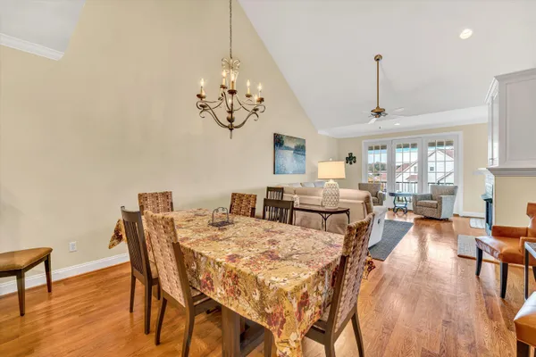 a view of a roof deck with furniture