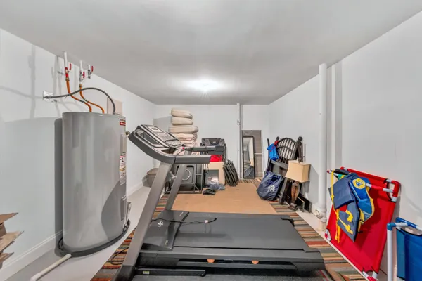 an aerial view of lake residential house with outdoor space and seating