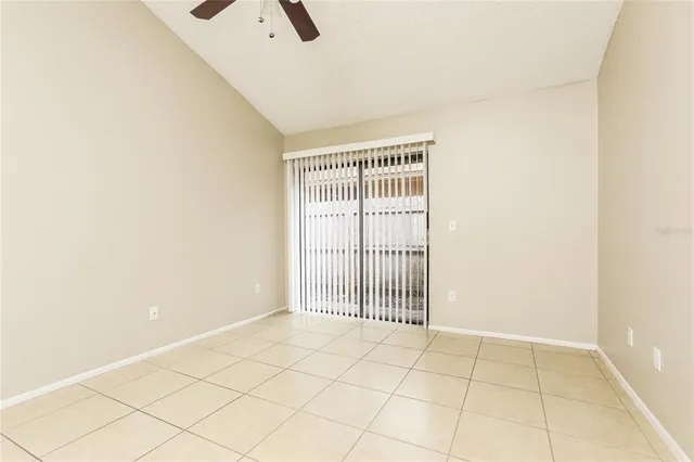 a bathroom with a tub a sink and a large mirror