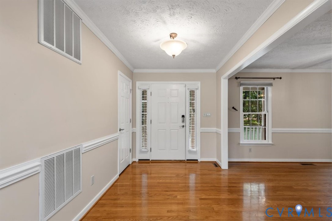 1437 Palmore Road Powhatan, VA 23139 - Photo 22 of 60 Entry foyer featuring wood-finish flooring, a whit