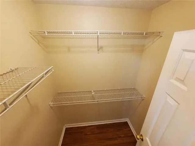 a view of a room with racks on the wall