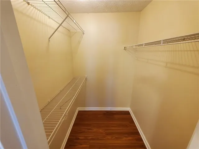 a view of a room with racks on the wall