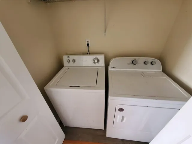 a utility room with dryer and washer