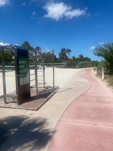 a view of lake with tree in front of it