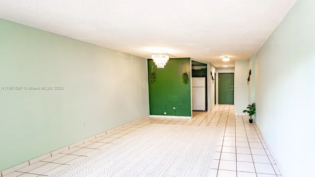 a view of a back yard from a hallway