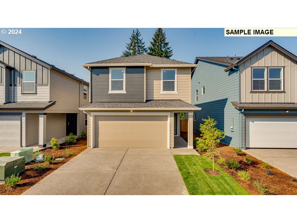 824 Northwest 175th Way Ridgefield, WA 98642 - Photo 1 of 19 a black and white photo of a house