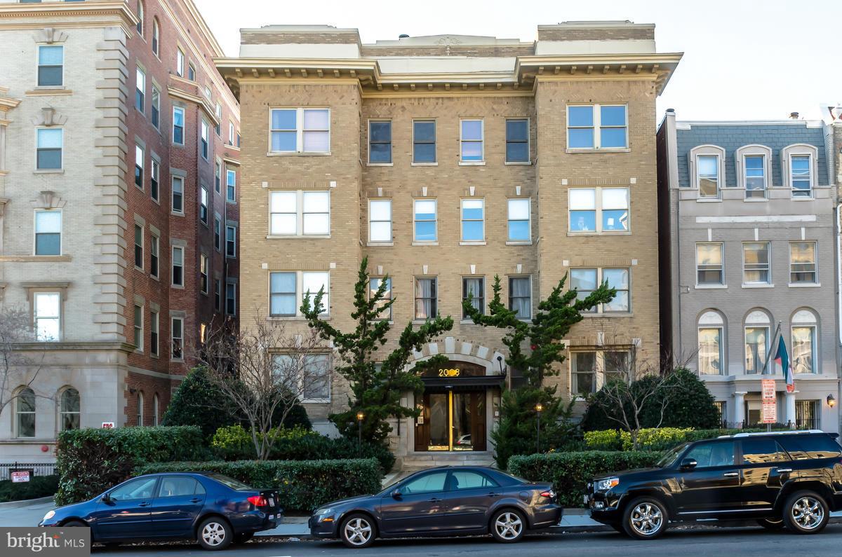 2008 16th Street Northwest, Unit 302 Washington, DC 20009 - Photo 1 of 11 a front view of a building with cars parked