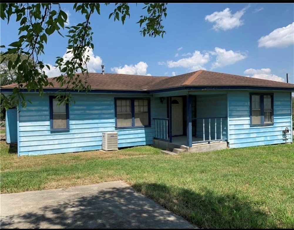 801 Ruben Chavez Road Robstown, TX 78380 - Photo 2 of 18 a view of a house with backyard and porch