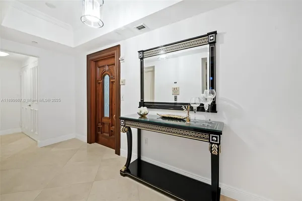 a bathroom with a sink a mirror and a vanity