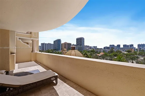 a terrace with a city view