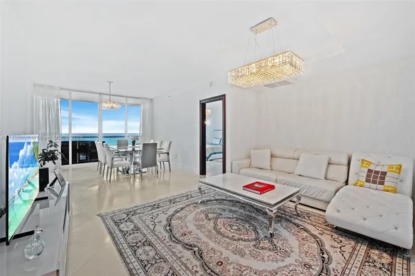a living room with furniture and a couch