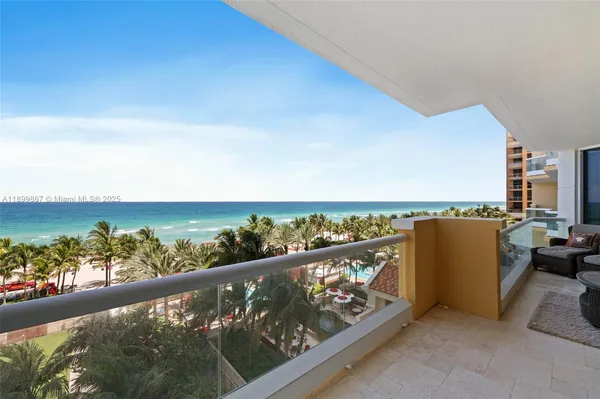 a view of a balcony and an ocean view