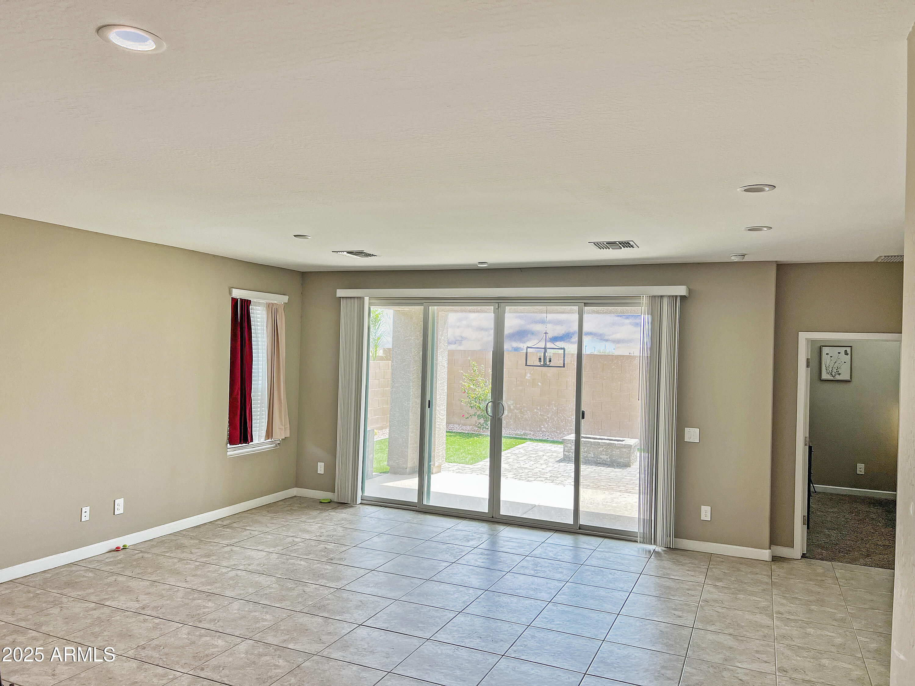 8491 West Springfield Way Florence, AZ 85132 - Photo 14 of 34 a view of an empty room with window