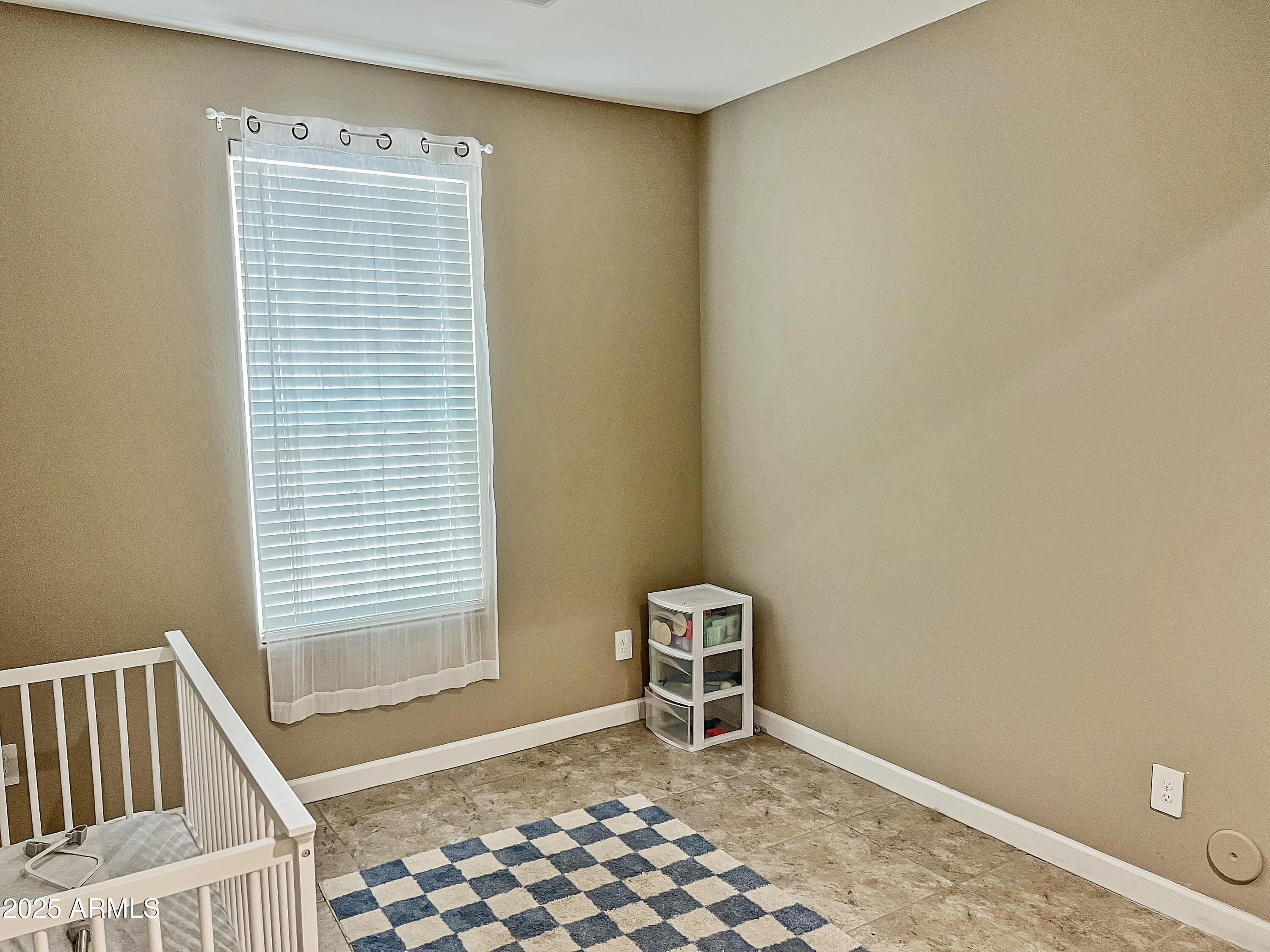 8491 West Springfield Way Florence, AZ 85132 - Photo 21 of 34 a view of room with window and furniture