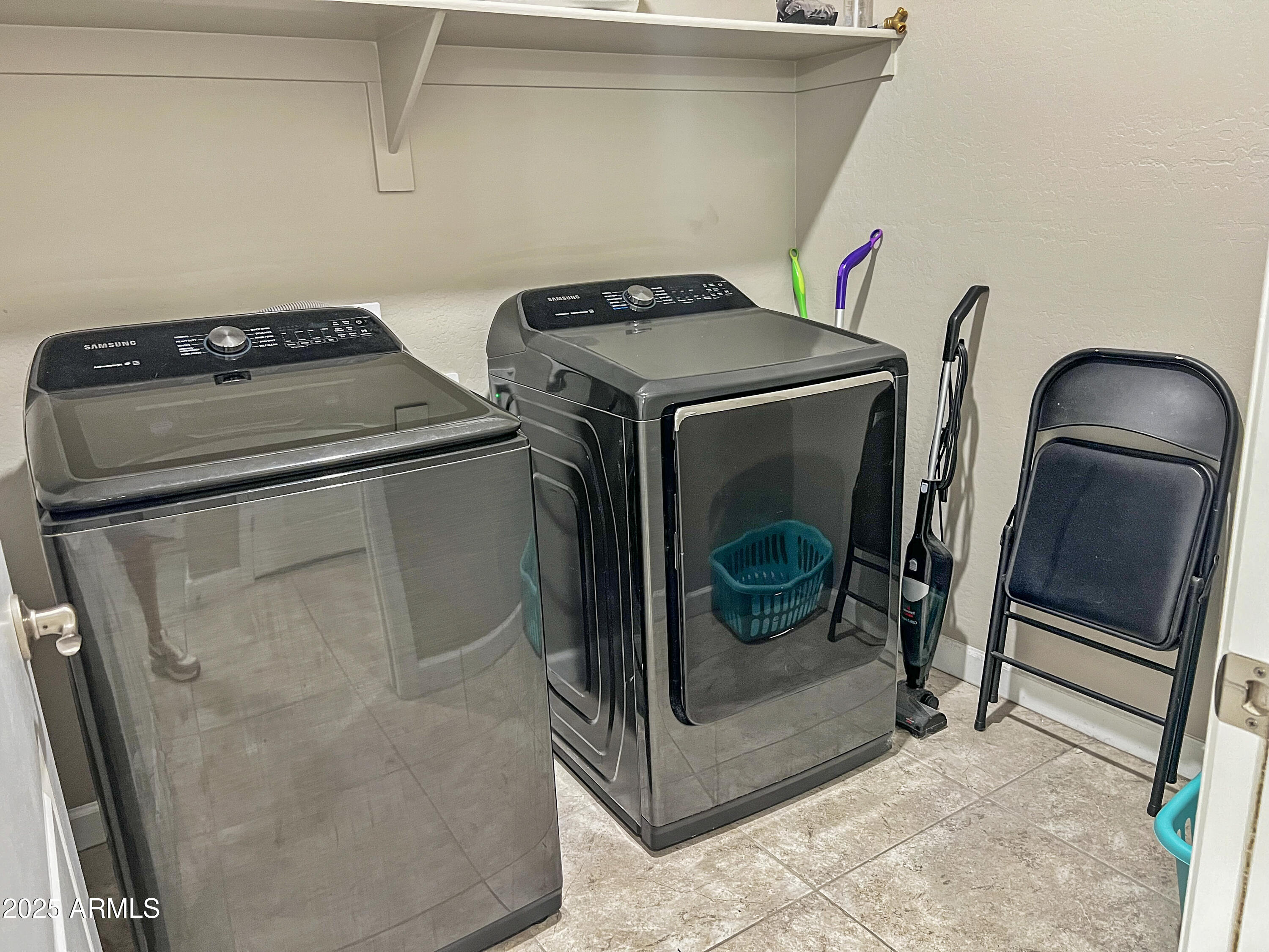 8491 West Springfield Way Florence, AZ 85132 - Photo 27 of 34 a utility room with dryer and washer
