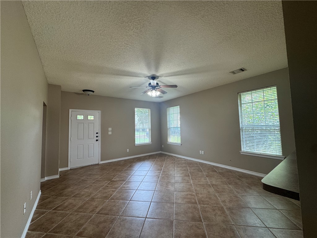 124 Sterling Street College Station, TX 77840 - Photo 7 of 13 a view of an empty room with a window