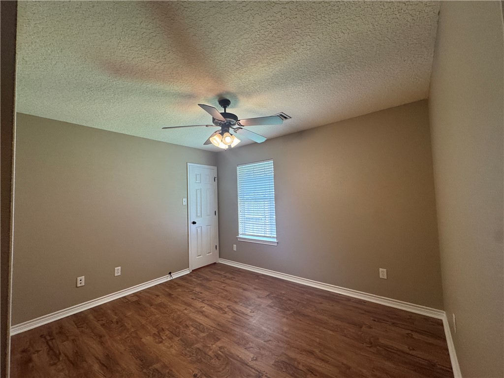124 Sterling Street College Station, TX 77840 - Photo 9 of 13 a view of an empty room with a window